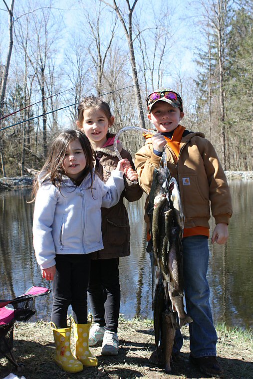 Tori and Tessa Rancourt, ages 4 and 6, and Daniel Cronk, age 7, all of Pleasant Valley, caught 14 trout.