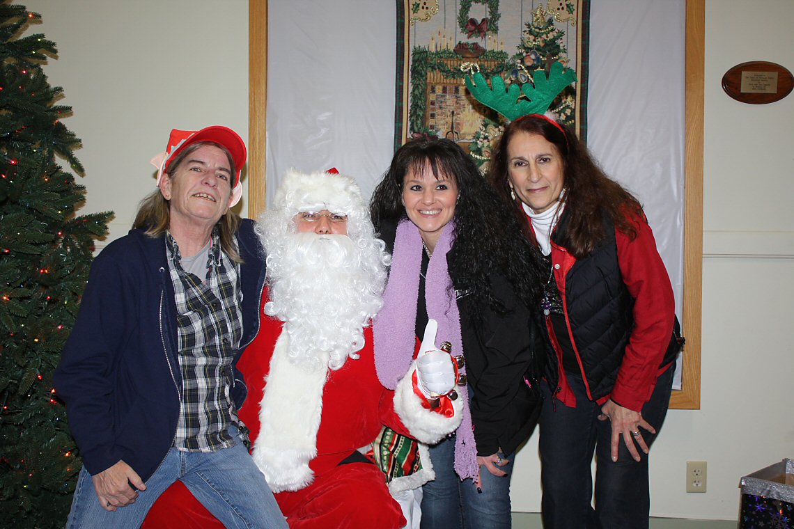 Santa and the Recreation Department Barb, ChrisAnn and Sandy.